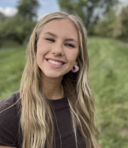 A woman smiling. 